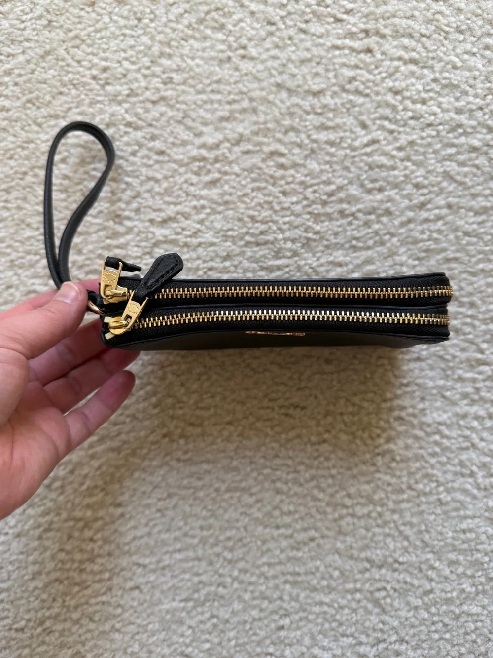 Coach Black Pebbled Leather Pouch with Gold Emblem
